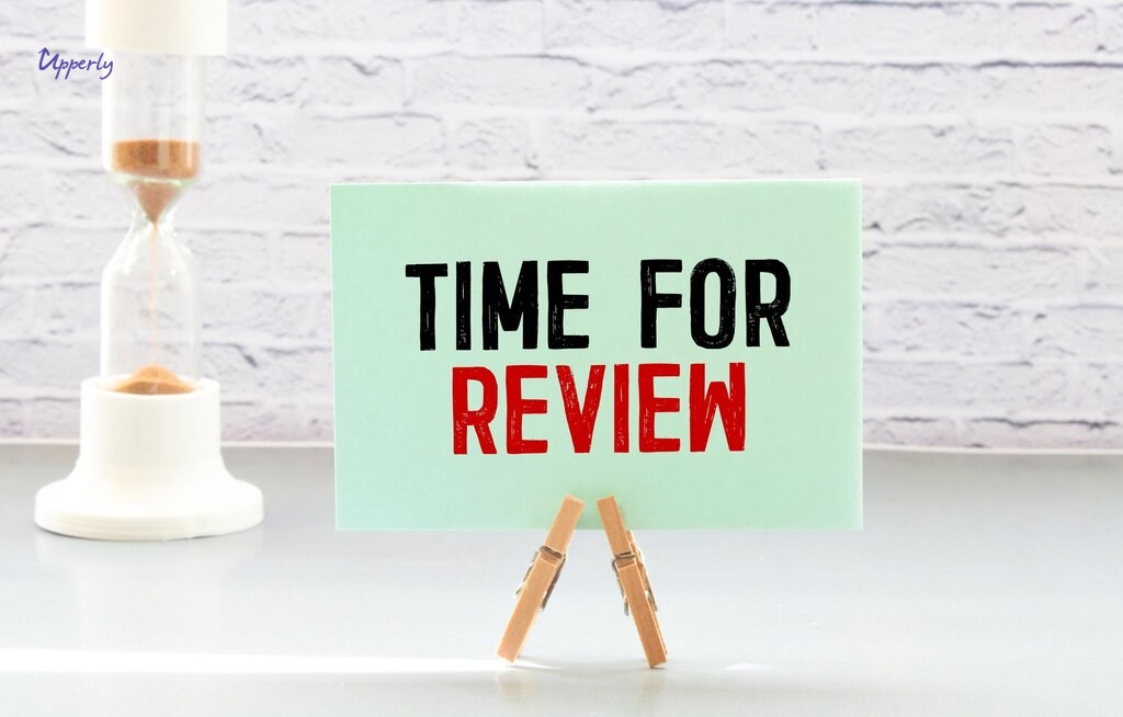 Small business owner handing purchase to happy customer at shop counter, ideal review request moment